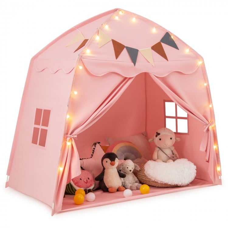 Extra large pink kids play tent with string lights, perfect for playtime, reading nook, or as a bed tent for children.