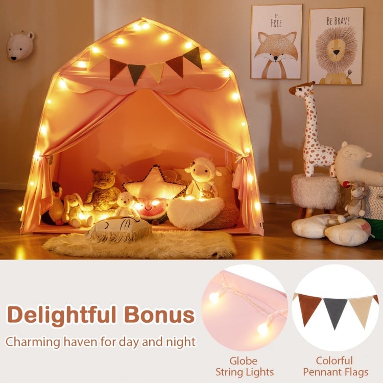 Extra large pink kids play tent with string lights and colorful flags, perfect for playtime and reading nooks.