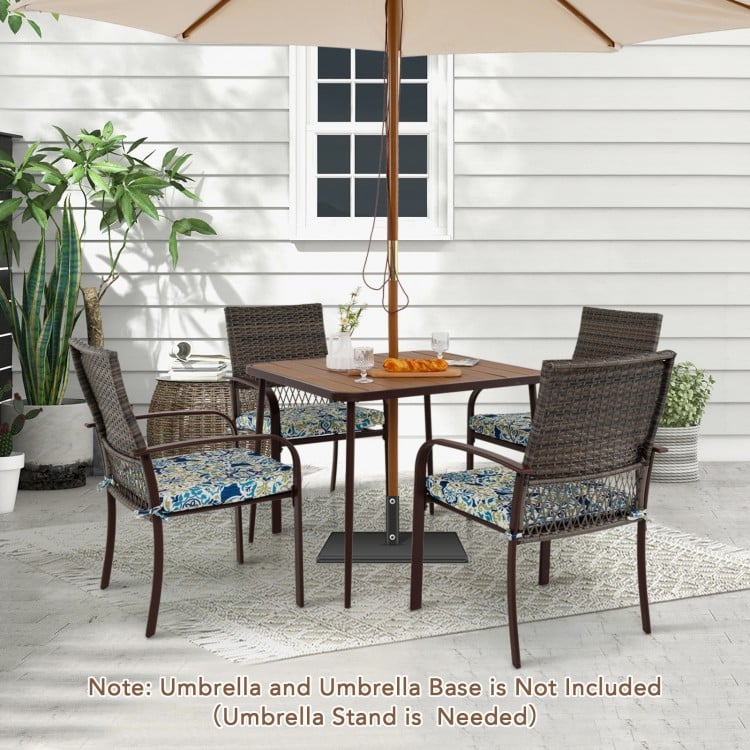 5-piece patio dining set featuring 4 cushioned rattan armchairs and a 35" square table, perfect for backyard gatherings.