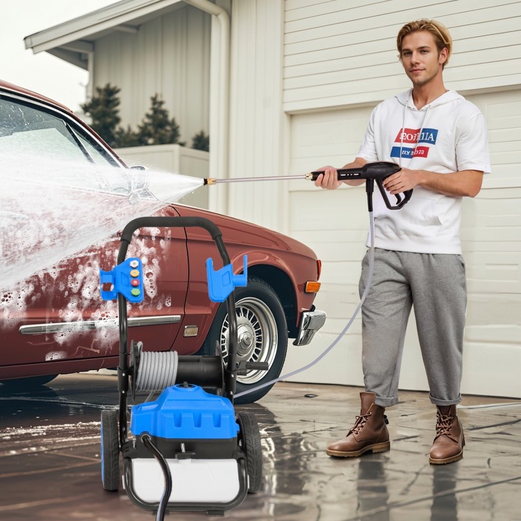 Electric pressure washer with wheels, 2300 PSI, 1.8 GPM, shown in use washing a car, featuring quick connect nozzles.