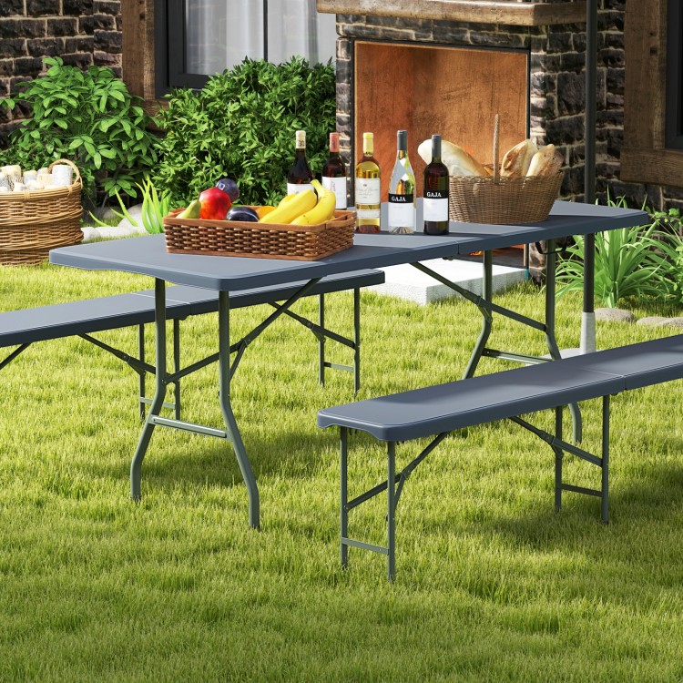 6 ft portable folding table with gray HDPE tabletop, ideal for outdoor use, supporting up to 350 lbs for gatherings.