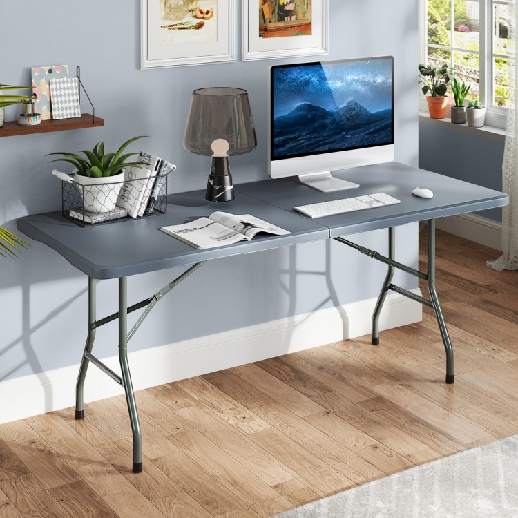 Gray 6 ft portable folding table with HDPE tabletop and metal legs, ideal for indoor and outdoor use.