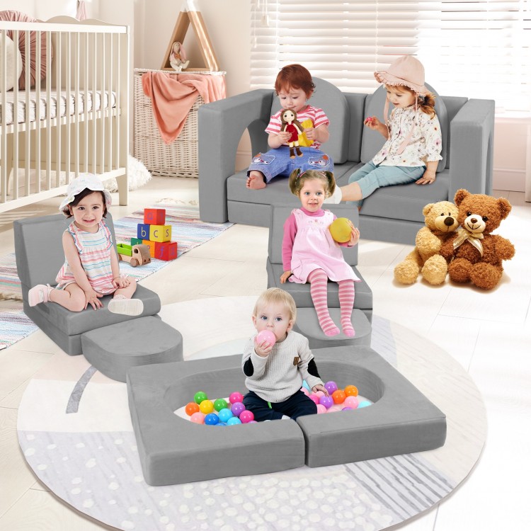 Modular kids play couch in gray with soft suede fabric, featuring 8 flexible pieces for creative configurations.