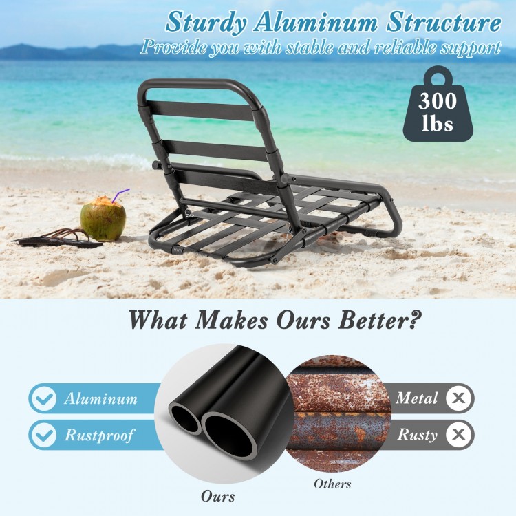 Low folding beach chair with blue cushion, lightweight aluminum frame, rustproof, perfect for outdoor use.