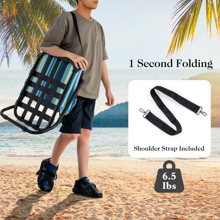 Low folding beach chair with cushion in blue, featuring lightweight aluminum frame and shoulder strap for easy.