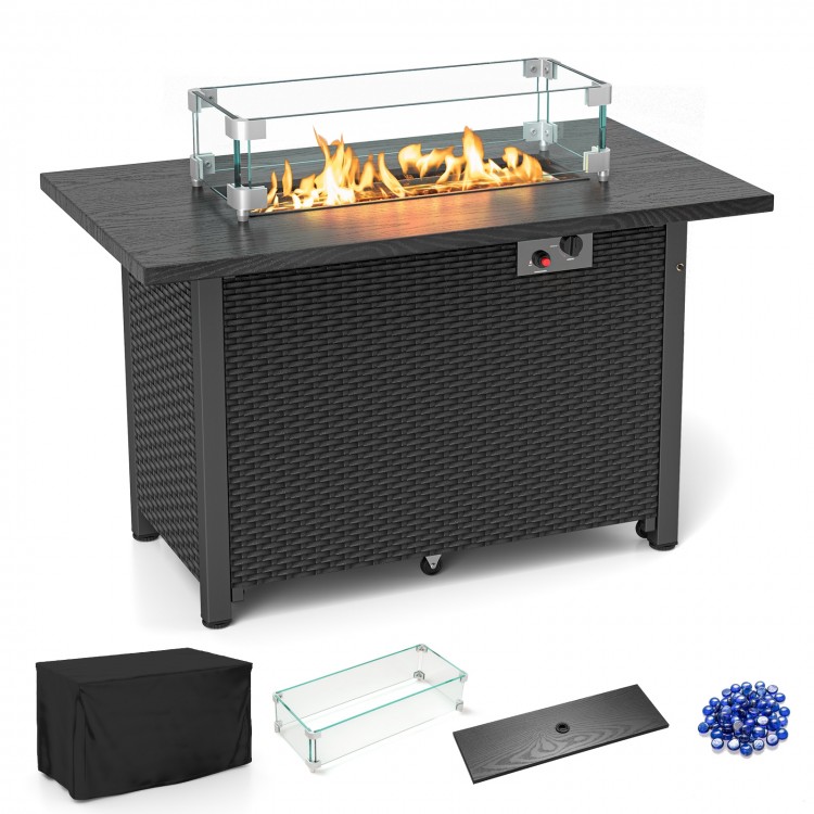 Black propane gas fire pit table with wind guard, 50,000 BTU output, and removable lid for versatile use.