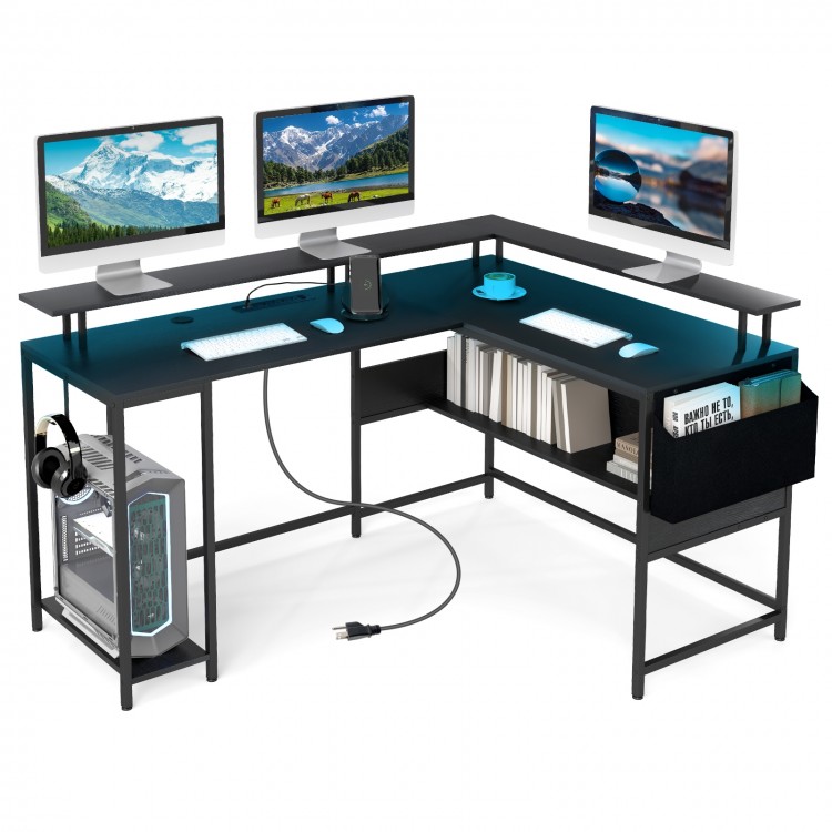 L-shaped gaming desk in black with LED lights, power outlets, and ergonomic monitor stand for enhanced workspace.