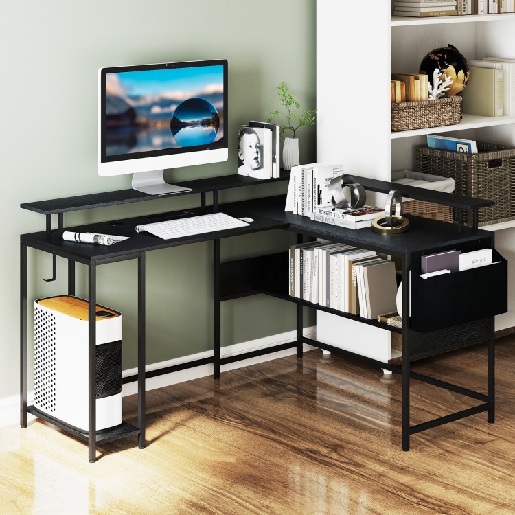 L-shaped black gaming desk with LED lights, power outlets, and ergonomic monitor stand for home office use.