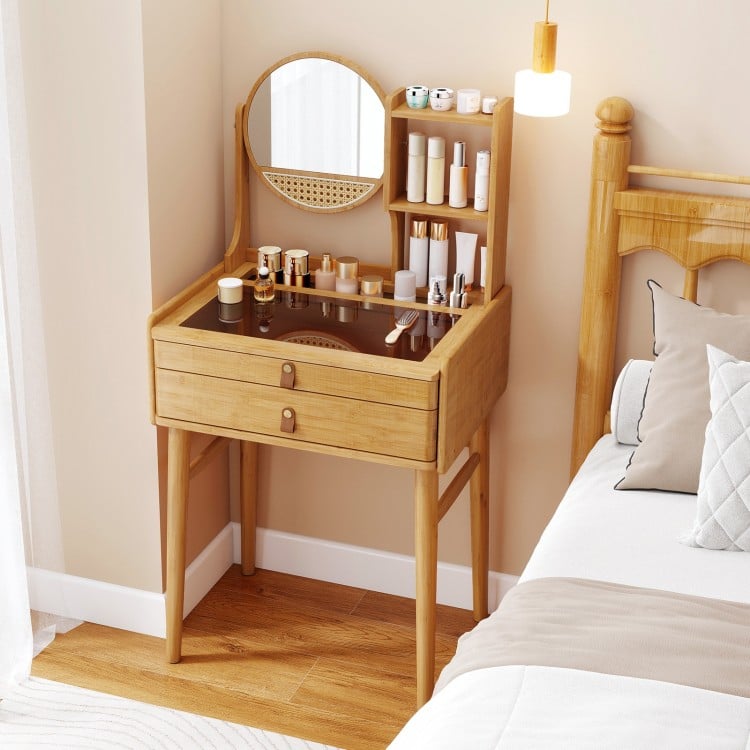 Compact 23.5-inch bamboo vanity desk with mirror, featuring 3 shelves and 2 drawers for organized makeup storage.