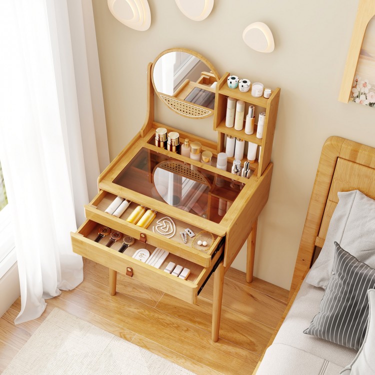 Small bamboo vanity desk with mirror, 2 drawers, and glass tabletop for organized storage in compact spaces.