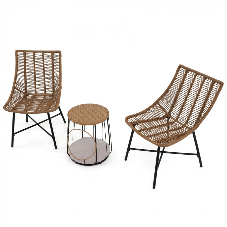 Two ergonomic brown rattan chairs with a side table, perfect for outdoor patio relaxation and pet comfort.