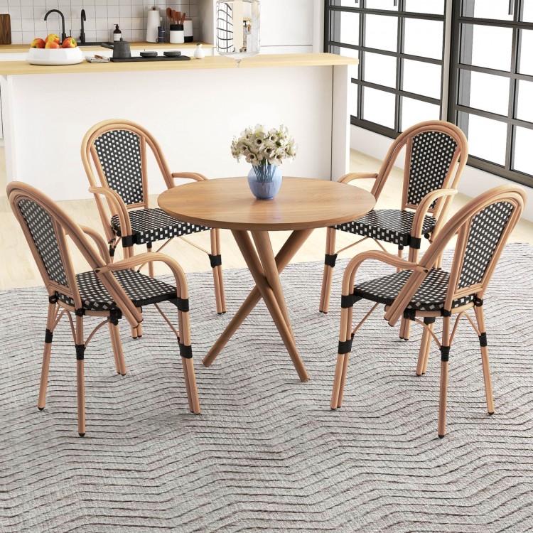 Round dining table with four hand-woven PE wicker French bistro chairs, perfect for outdoor patio or backyard use.