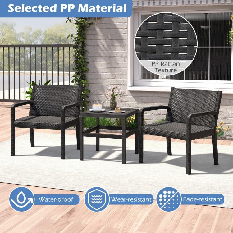 Black 3 piece patio furniture set featuring 2 rattan armchairs and a square side table, perfect for outdoor relaxation.