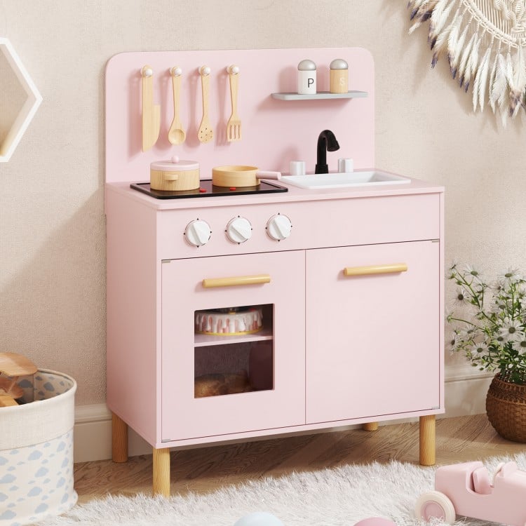 Kids kitchen playset in pink with dual stoves, oven, and storage, perfect for imaginative role-playing and organization.