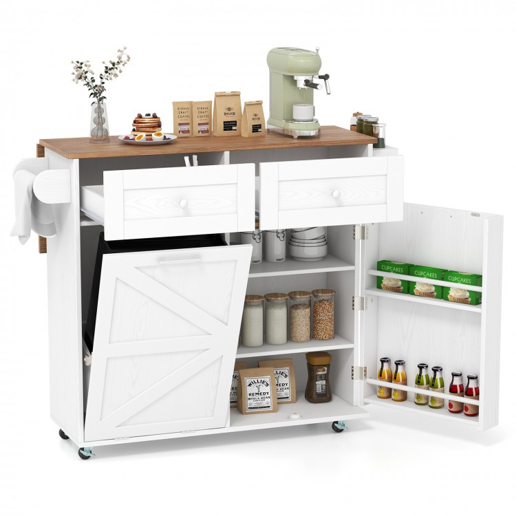 Rolling kitchen island in white with drop leaf top, storage drawers, and tilt-out trash cabinet on rubber wheels.