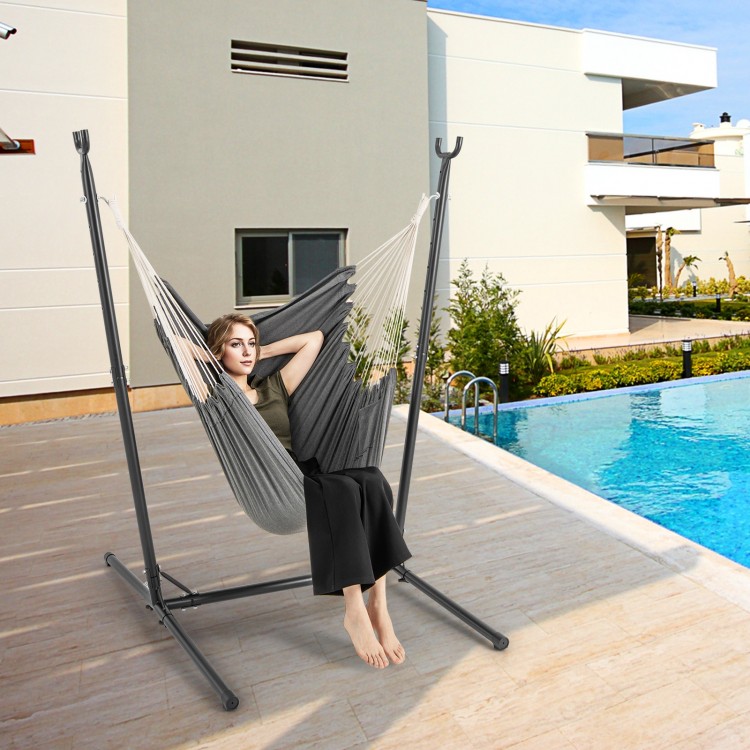 Hammock chair with stand in gray, featuring adjustable height and side pocket, perfect for outdoor relaxation by the.