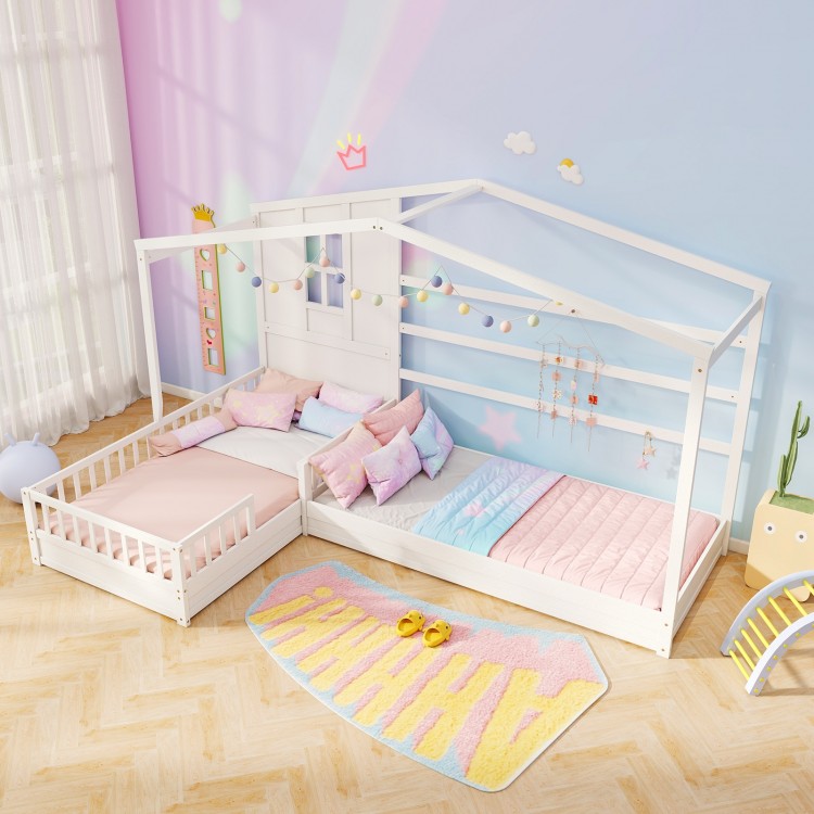 L-shaped double twin beds in white with house frame, safety guardrails, and colorful bedding for children's room.