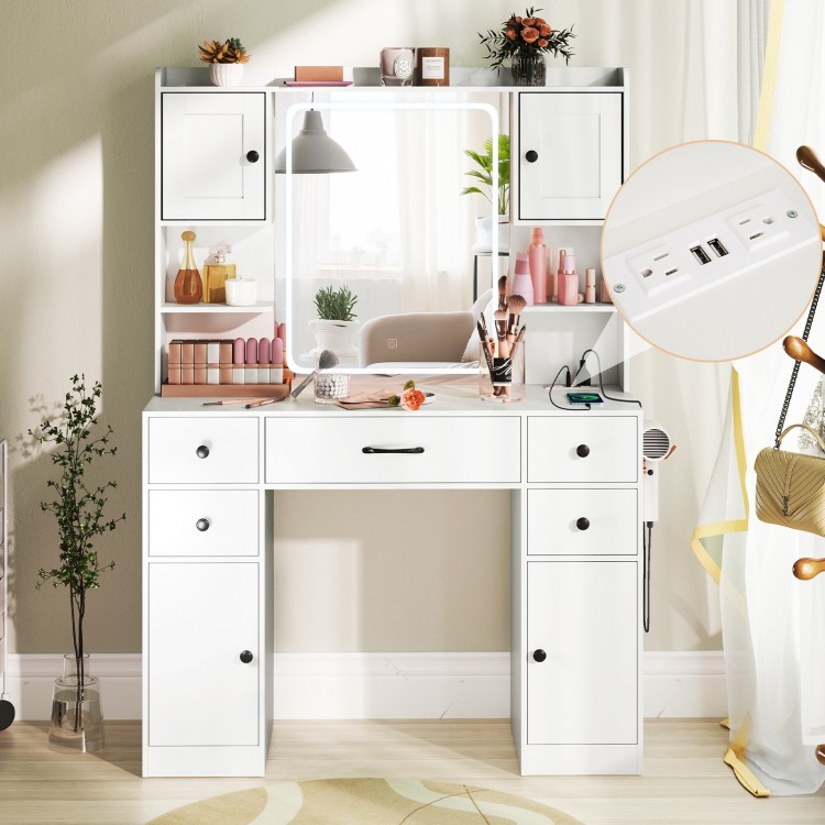Makeup vanity desk in white featuring a lighted mirror, charging station, and ample storage with adjustable shelves.