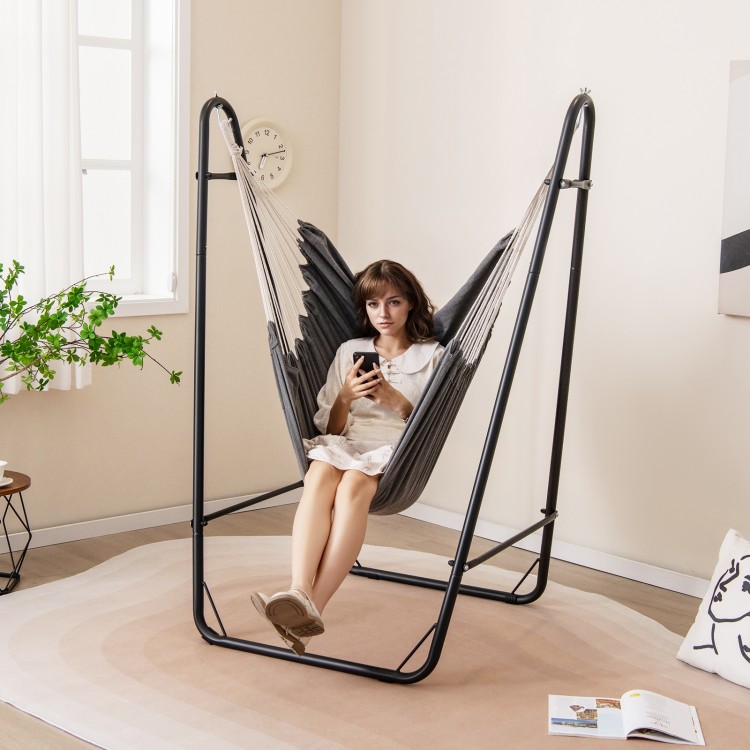 Hammock chair with gray fabric and heavy-duty metal frame, featuring a side pocket for storage, perfect for indoor.
