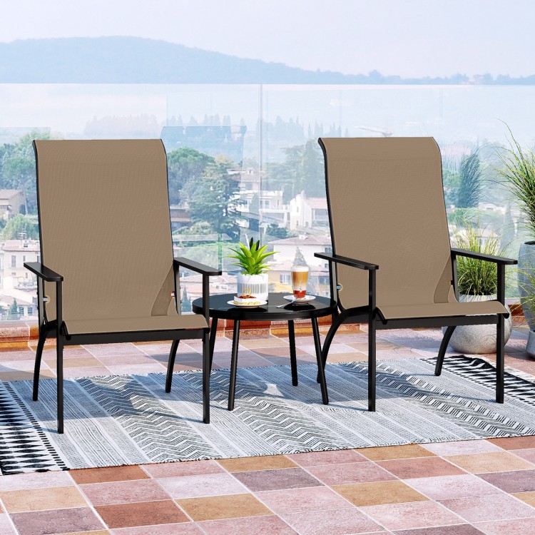 Two outdoor Adirondack chairs with high backs and a metal frame, perfect for patio relaxation and garden use.