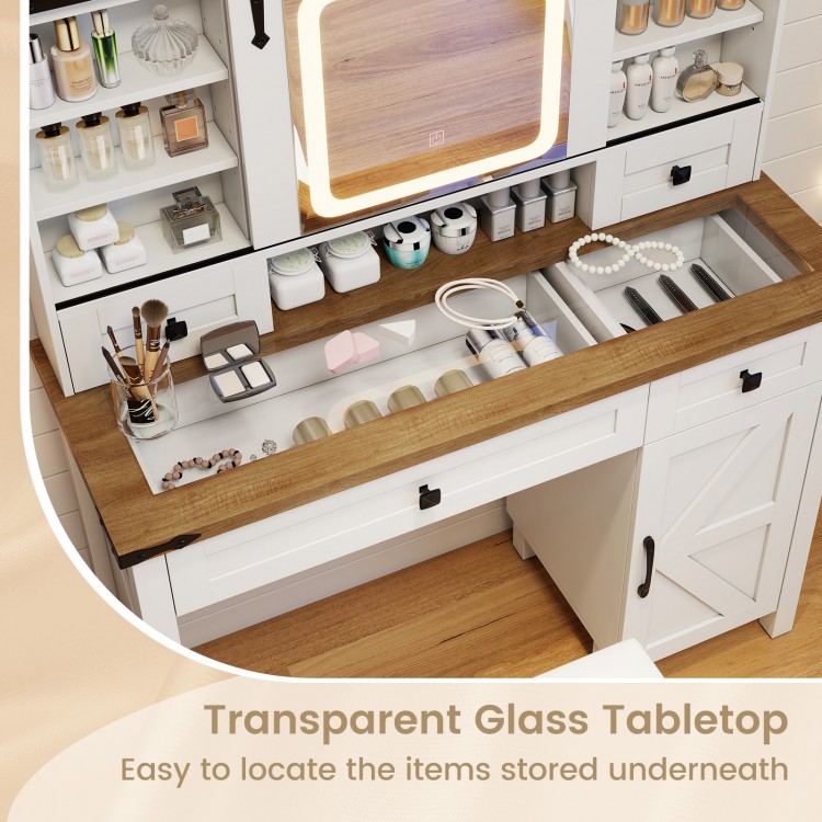 Makeup vanity desk with transparent glass tabletop, featuring a 3-color LED mirror and ample storage for cosmetics.