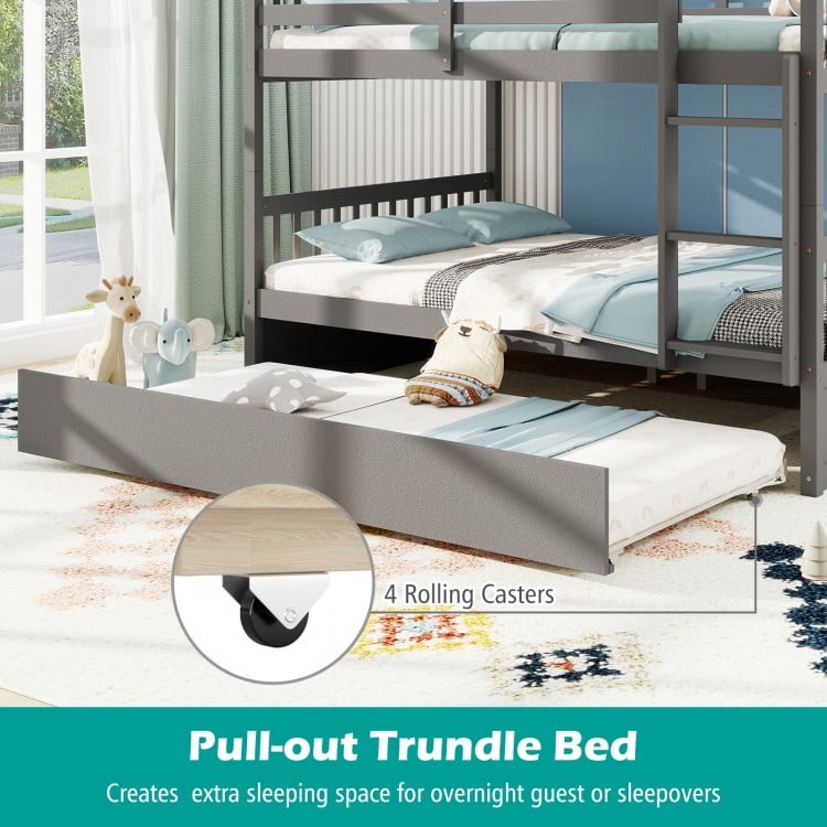Pull-out trundle bed with 4 rolling casters for extra sleeping space under the Full over Full Bunk Bed in gray.