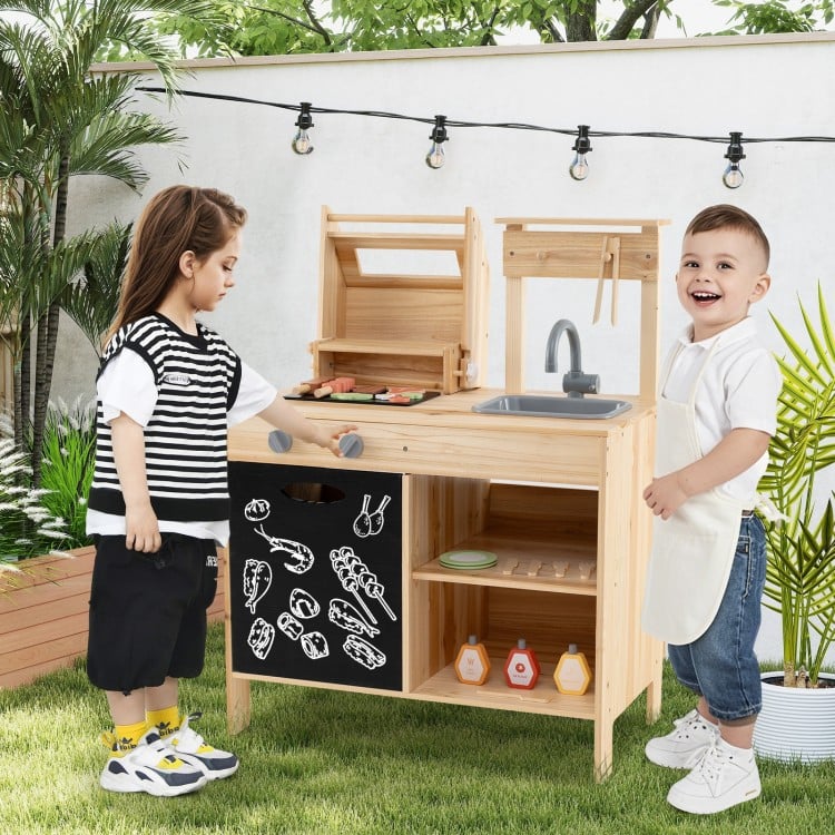 Wooden barbecue grill playset with sink, chalkboard, and storage, perfect for kids' imaginative outdoor play.