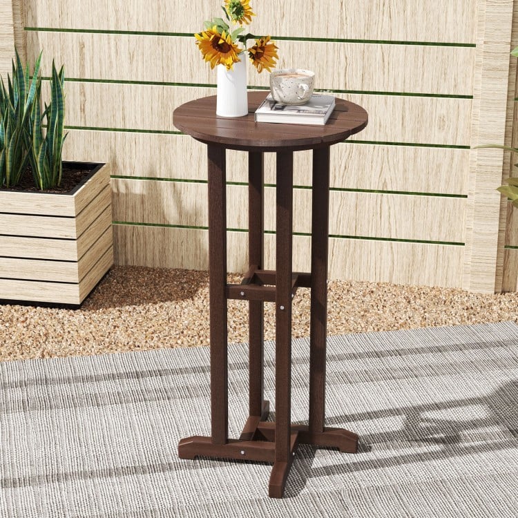 Round bar table in brown HDPE with slatted design, 21.5" height, ideal for outdoor dining by the poolside or balcony.