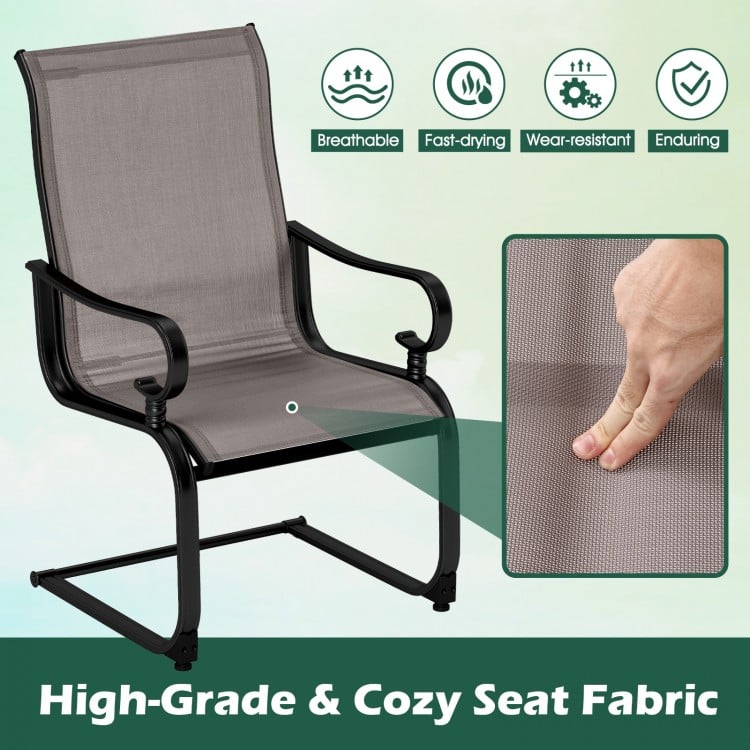 Gray patio chair featuring breathable, quick-drying fabric and sturdy metal frame, perfect for backyard relaxation.