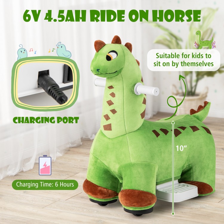 Green 6V kids ride-on dinosaur with padded seat, foot pedal, and charging port, perfect for independent play.
