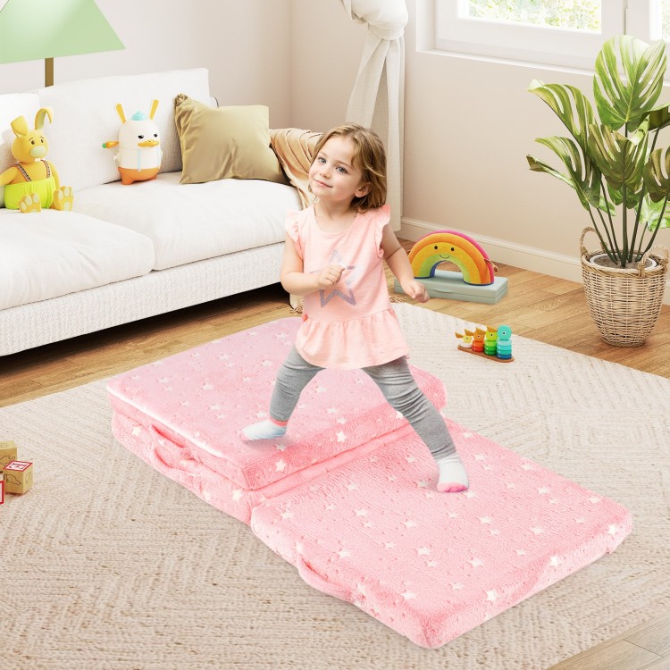 Foldable pink floor mattress for kids with washable flannel cover, perfect for playtime or relaxation in any room.