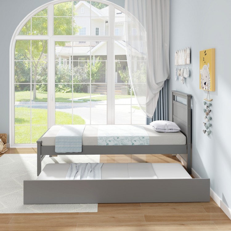 Twin size gray wooden bed frame with trundle, featuring sturdy slats and clean lines for versatile bedroom use.