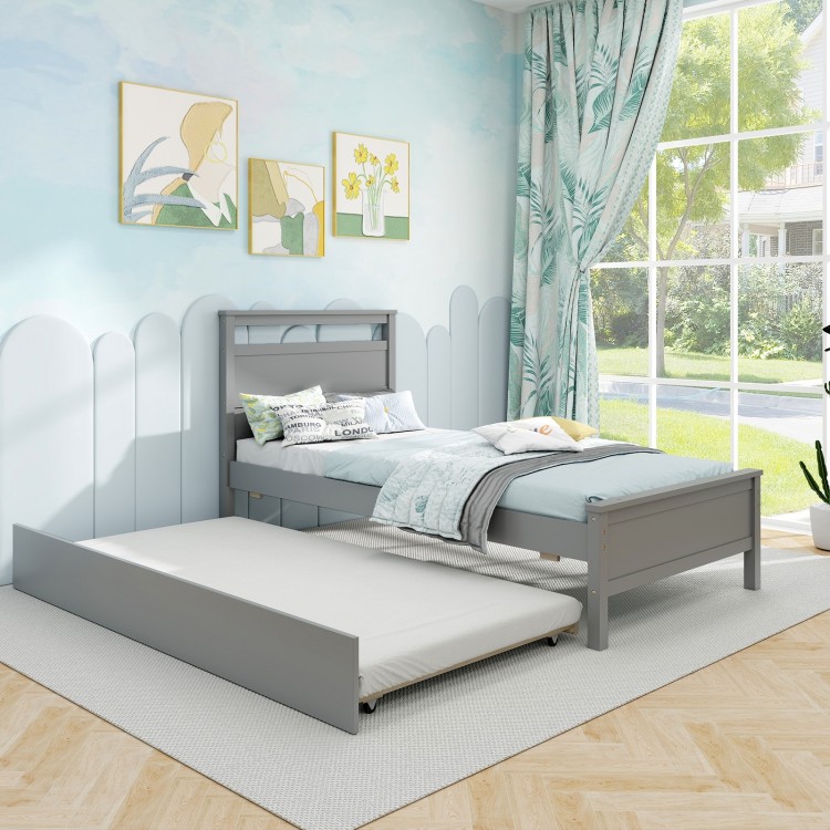 Twin size gray wooden bed frame with trundle, showcasing flexible wheels and thoughtful drawer stoppers for stability.