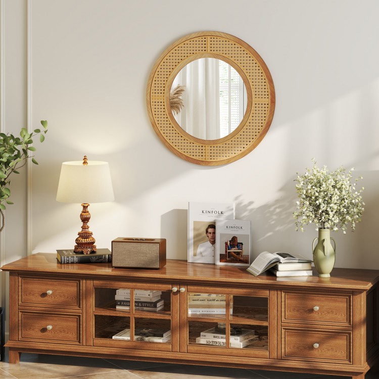 Bohemian round wall-mounted mirror with a natural wooden frame, ideal for living room or entryway decor.