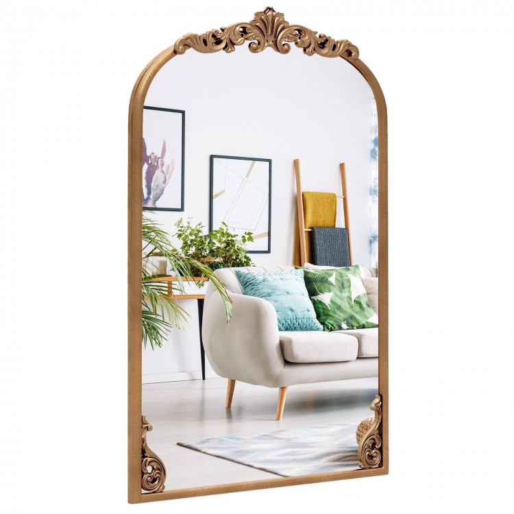 Arched gold baroque mirror with ornate frame, perfect for enhancing entryways and living rooms.