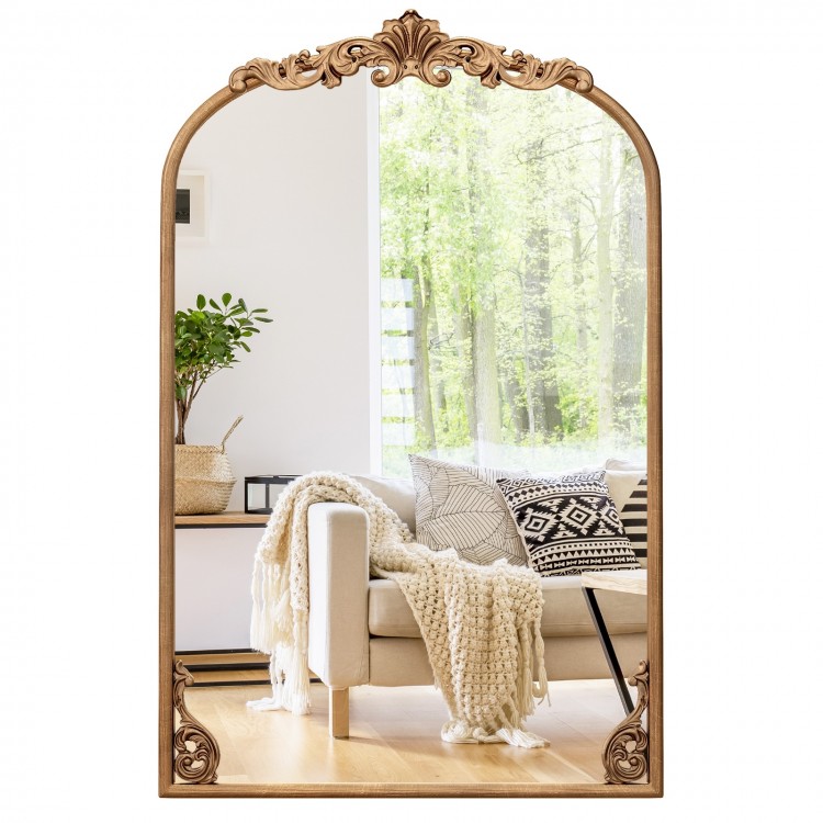 Arched gold baroque mirror with ornate frame, ideal for living rooms and entryways, showcasing timeless elegance.