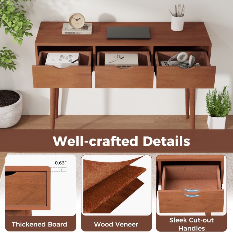 48-inch walnut writing desk with three drawers, solid wood legs, and sleek cut-out handles for organized workspace.