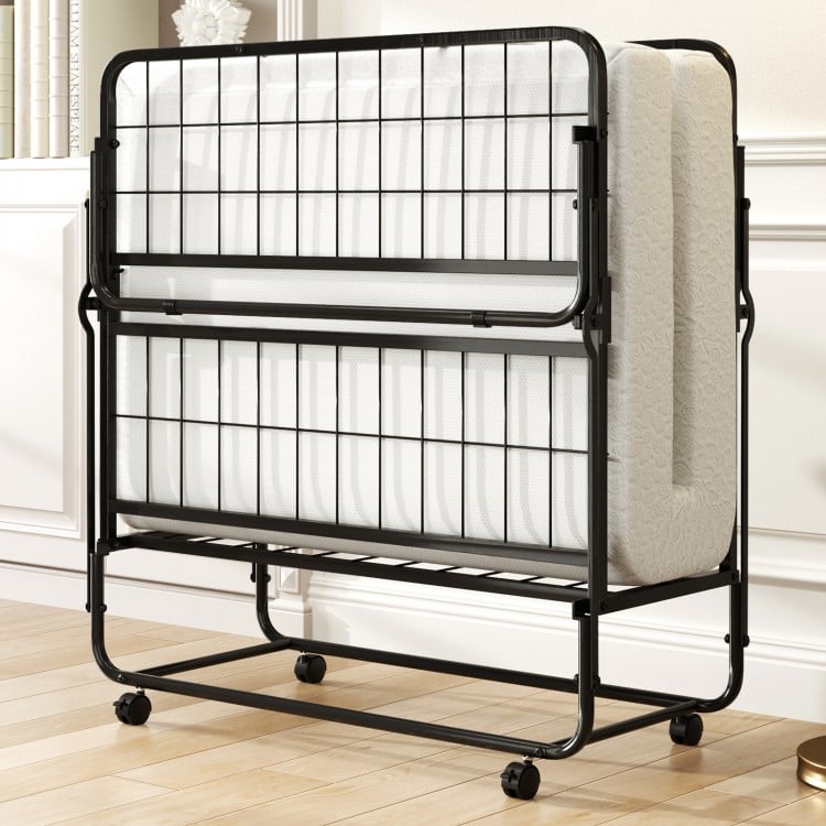 Twin size folding bed with memory foam mattress, featuring a fixing strap and a compact design for secure storage.