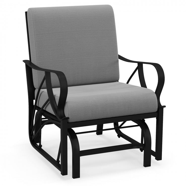 Patio glider rocking chair with gray thick cushion and curved armrests, featuring a durable metal frame for outdoor.