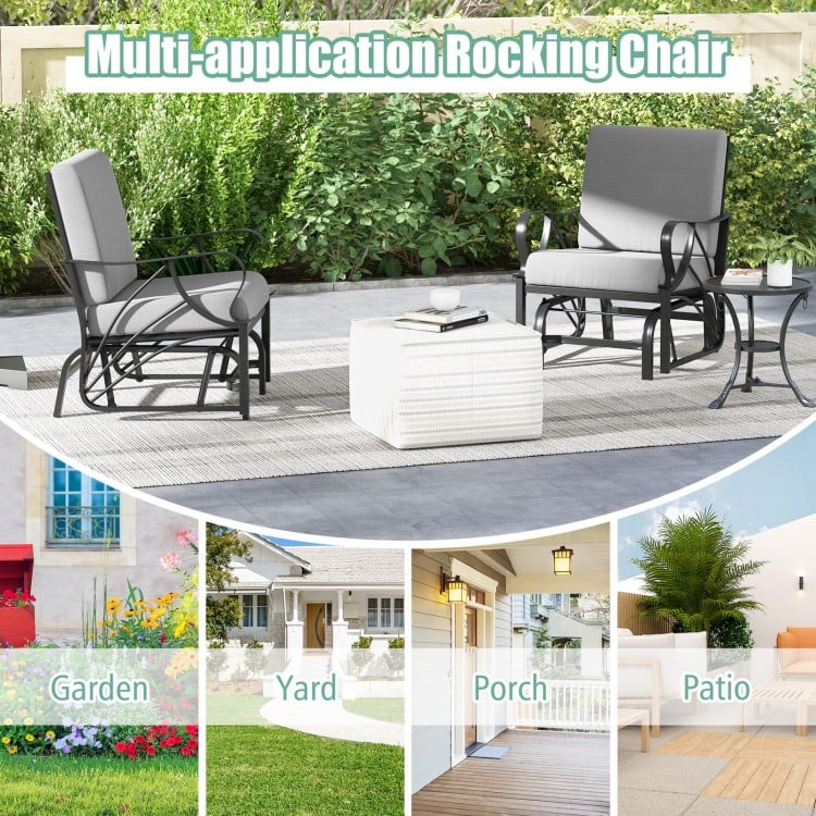Patio glider rocking chair with thick gray cushion and curved armrests, perfect for outdoor relaxation in various.