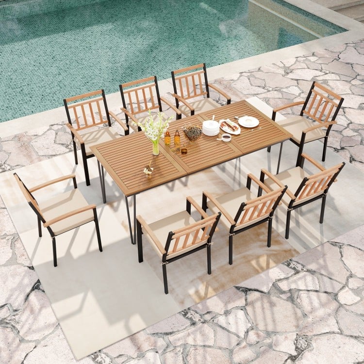 9-piece patio dining set featuring a 35.5-inch acacia wood table and 8 chairs with cushions, perfect for outdoor dining.