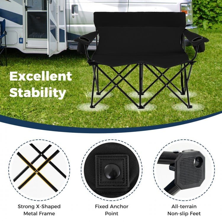 Double camping chair for 2 adults in black, featuring a strong metal frame, cup holders, and non-slip feet for outdoor.
