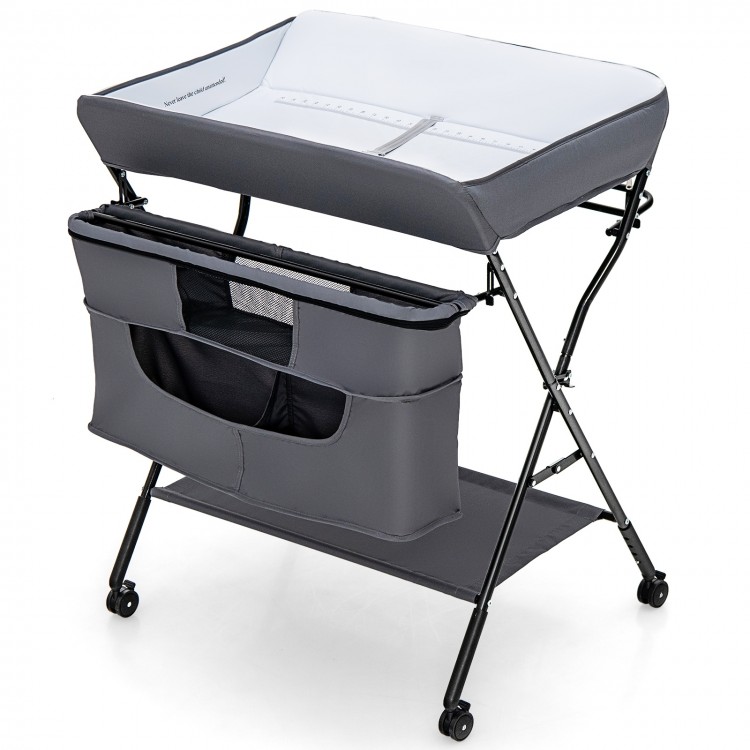 Portable adjustable height baby changing table in gray with storage, wheels, and waterproof surface for easy cleaning.