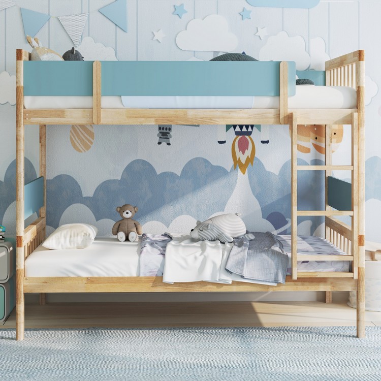 Under-bed space of the twin over twin bunk bed in natural wood, providing storage options and easy cleaning access for.