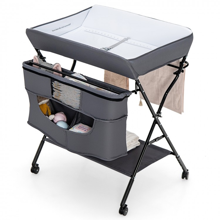 Portable adjustable height baby changing table in gray with storage pockets and wheels for easy mobility and.