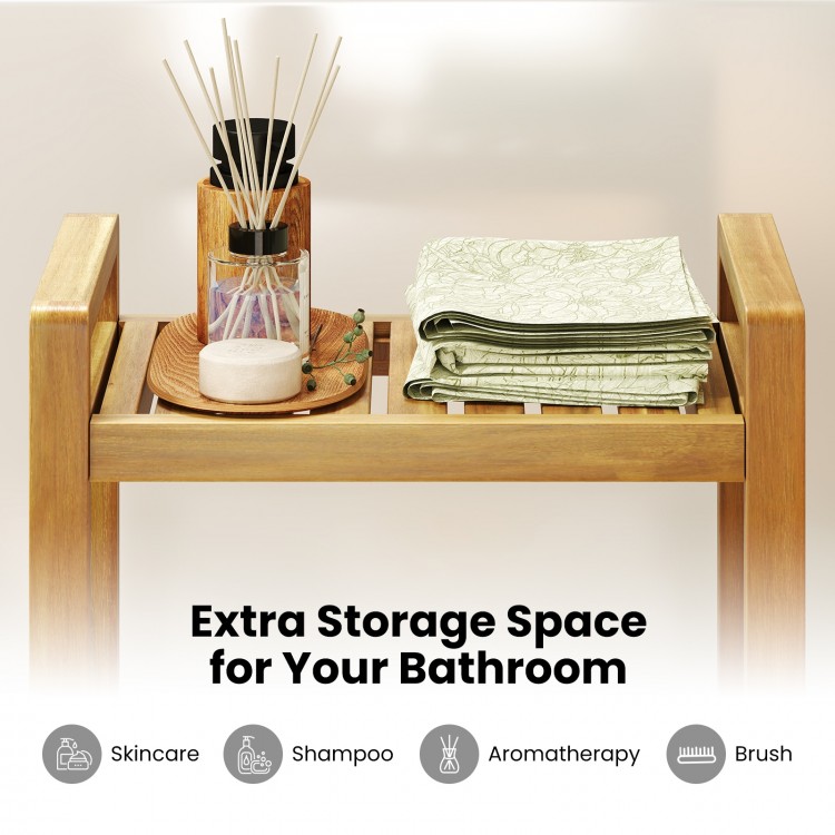 Teak wood shower bench showcasing extra storage space with towels and skincare items, ideal for bathroom organization.