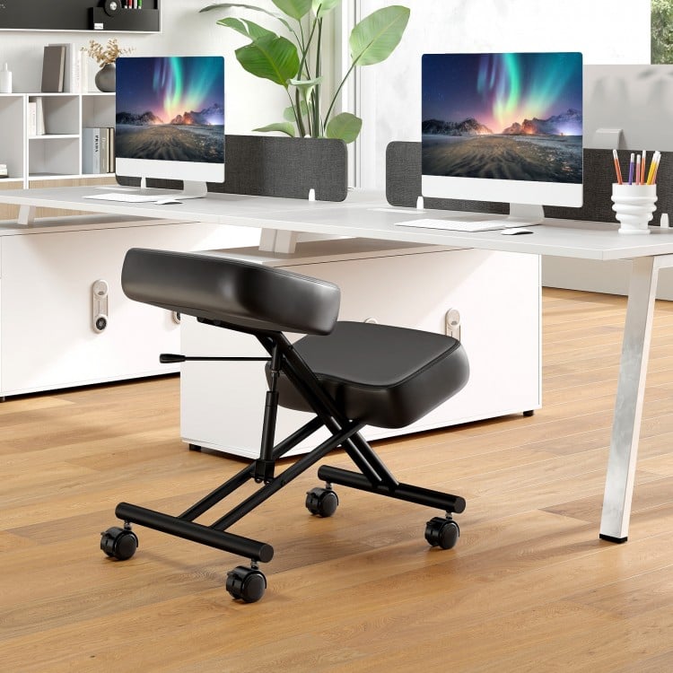 Height adjustable kneeling chair with black faux leather, padded cushions, and wheels for posture correction in an.