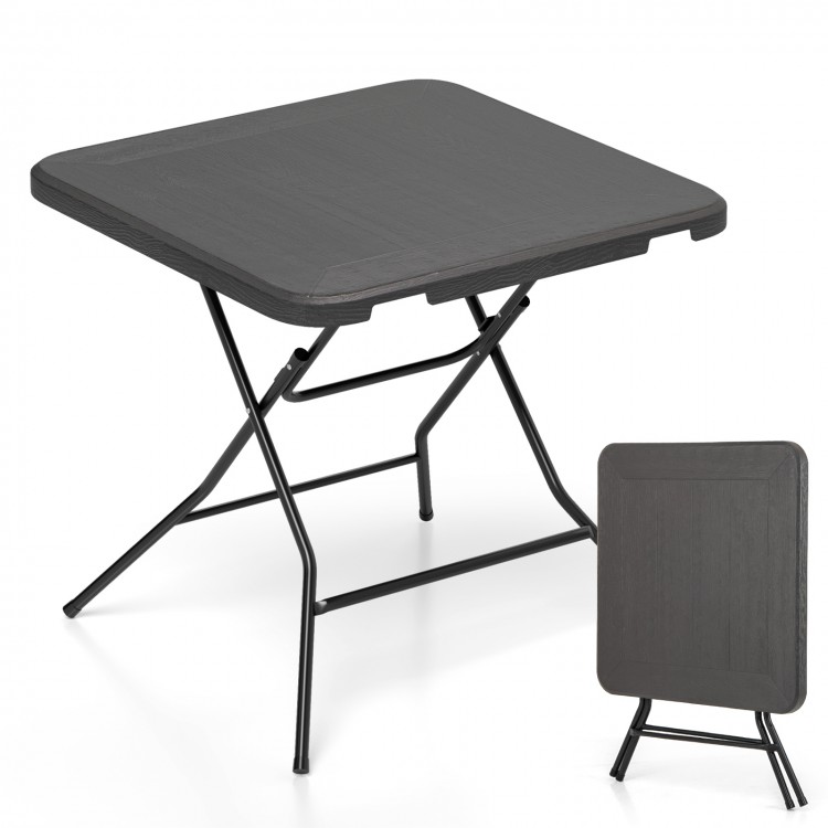 Foldable 2.6FT dining table with wood grain HDPE tabletop, stable X-shaped frame, ideal for indoor and outdoor use.