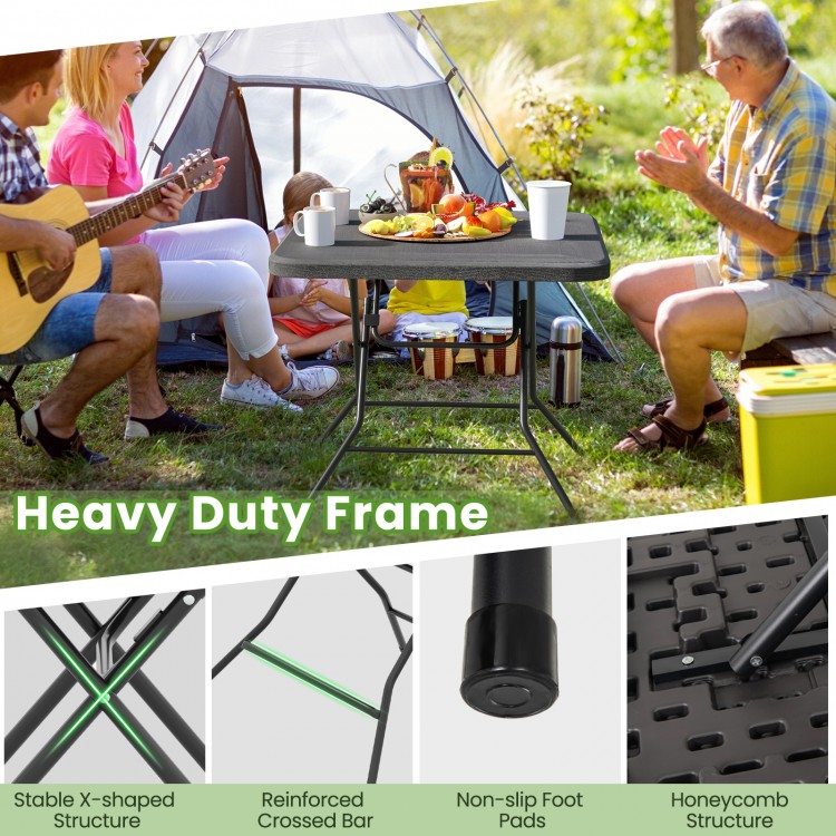 Foldable 2.6FT dining table with wood grain HDPE tabletop, heavy-duty frame, and non-slip foot pads for outdoor use.