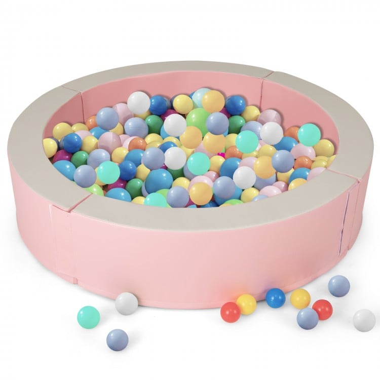 Detachable pink foam ball pit with 50 colorful ocean balls, spacious for 2 children, ideal for safe play and fun.